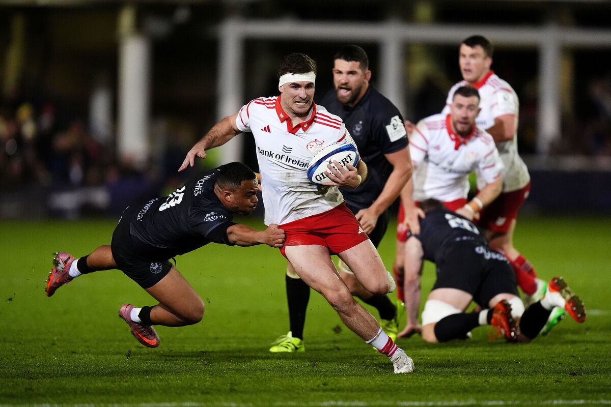 Munster Rugby's Shane Daly gets away from Bath Rugby's Max Ojomoh. Picture: Mike Egerton/PA Wire.