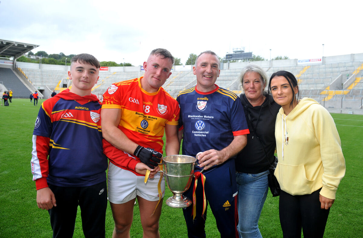  Éire Óg manager Donal Hurley (centre) with his family after winning the Co-Op SuperStores IAHC title in the 2020 season. Picture: Larry Cummins