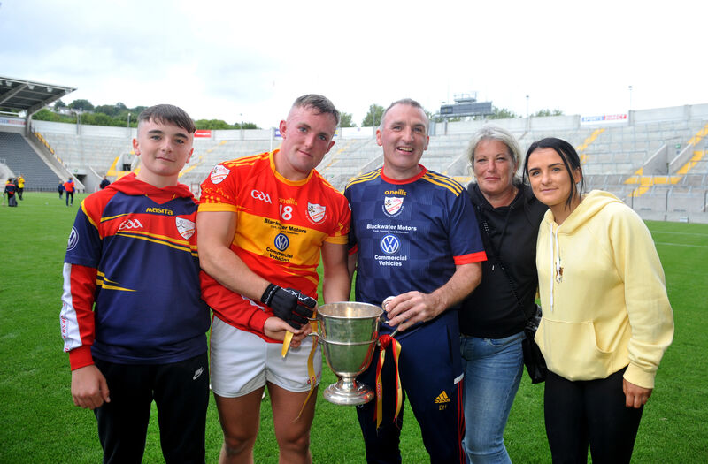  Éire Óg manager Donal Hurley (centre) with his family after winning the Co-Op SuperStores IAHC title in the 2020 season. Picture: Larry Cummins