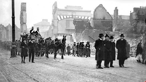 The funeral of volunteer Jeremiah Delany passes through Patrick Street on the morning of December 12, 1920, on its way to St Finbarr's Cemetery, shortly after the burning of Cork overnight on December 11, events brought vividly to life in a new free exhibition hosted in St Peter's, North Main Street, Cork. Picture: Irish Examiner Archives The funeral of volunteer Jeremiah Delany passes through Patrick Street on the morning of December 12, 1920, on its way to St Finbarr's Cemetery, shortly after the burning of Cork overnight on December 11, events brought vividly to life in a new free exhibition hosted in St Peter's, North Main Street, Cork. Picture: Irish Examiner Archives