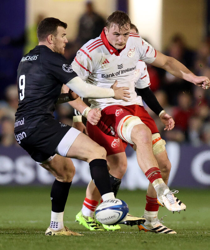 Bath's Ben Spencer challenges Gavin Coombes of Munster. Picture: INPHO/Tom Maher