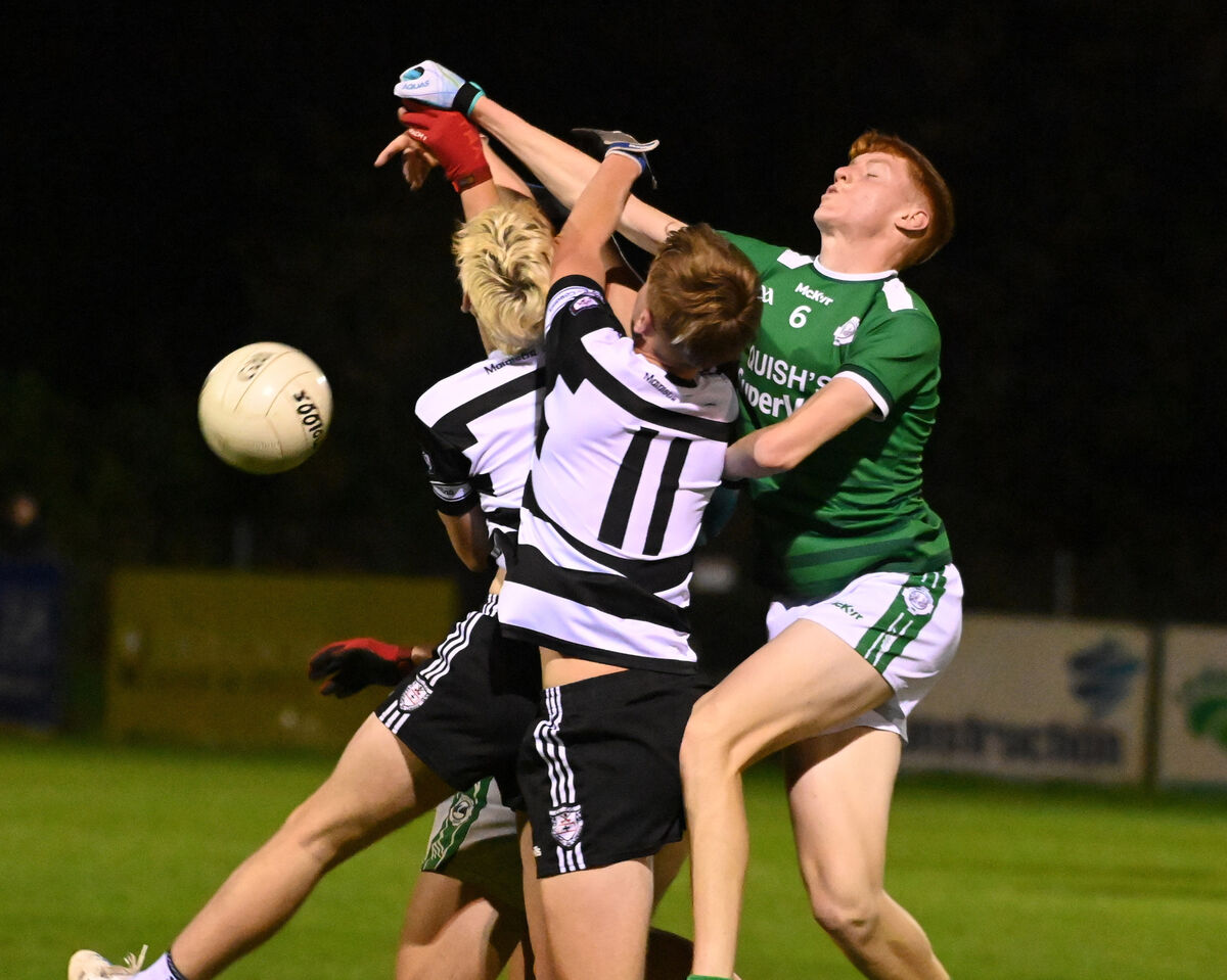 Ballincollig's Eanna Lynch gets above Midleton's Alfie Hennessy and Charlie McCarthy during the Rebel Óg U16 Premier 1 FC final at Sallybrook. Picture: Eddie O'Hare