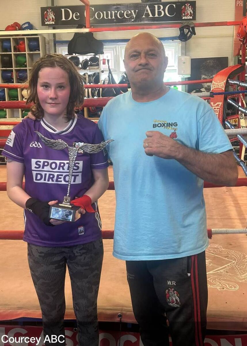 Cork Boxing: Reitlin Devereux with her school award for boxing and De Courcey head coach Will Rossall.