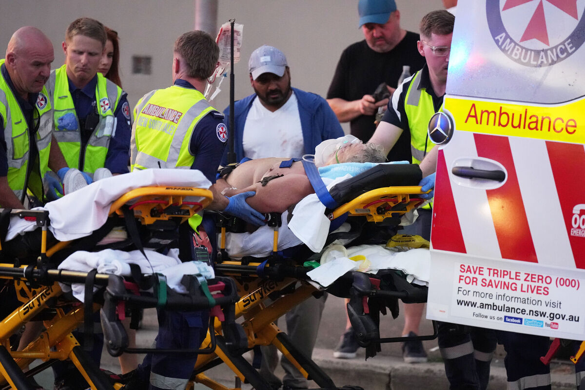 Emergency workers transport a person on a stretcher after a reported shooting at Bondi Beach in Sydney, Sunday, Dec. 14, 2025. (AP Photo/Mark Baker) Emergency workers transport a person on a stretcher after a reported shooting at Bondi Beach in Sydney, Sunday, Dec. 14, 2025. (AP Photo/Mark Baker)