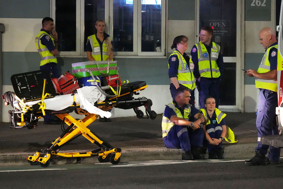 Emergency workers standby at Bondi Beach after a reported shooting in Sydney, Sunday, Dec. 14, 2025. (AP Photo/Mark Baker) Emergency workers standby at Bondi Beach after a reported shooting in Sydney, Sunday, Dec. 14, 2025. (AP Photo/Mark Baker)