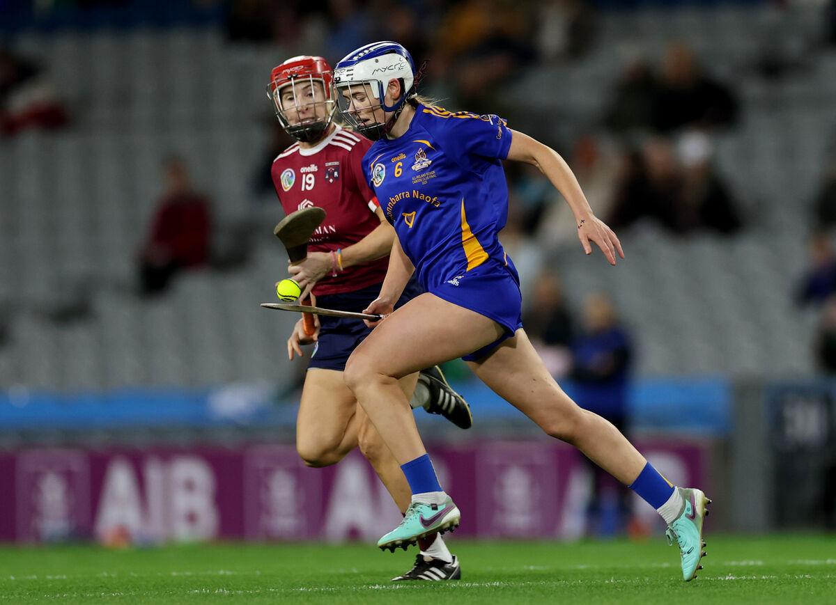 Athenry’s Therese Donohue watches as Méabh Cahalane of St Finbarr's bursts up the pitch. Picture: INPHO/James Crombie