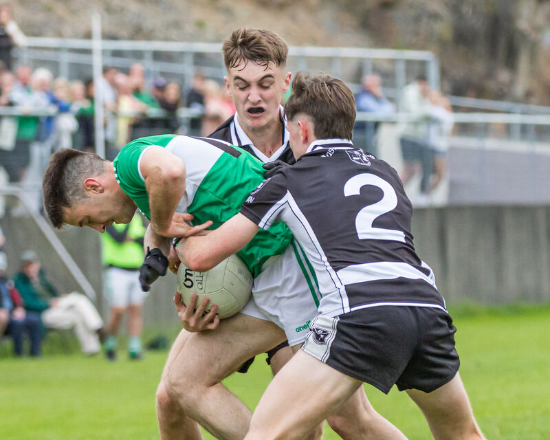 Castletownbere's Jack Hanley and Billy Murphy tackle Macroom's Eolan O'Leary this year. Picture: Anne Marie Cronin Castletownbere's Jack Hanley and Billy Murphy tackle Macroom's Eolan O'Leary this year. Picture: Anne Marie Cronin