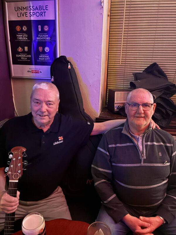 Former Neptune player Johnny O’Mahony with ex-Gonkers player Johnny Crean getting their instruments ready at the Gonkers reunion night.