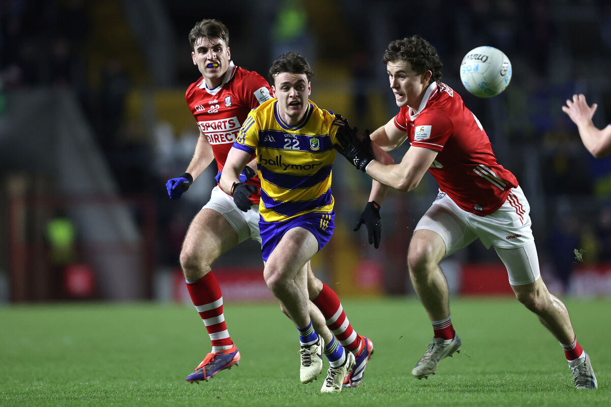 Roscommon's Ben O’Carroll and Neil Lordan of Cork tussle for the ball. Picture: INPHO/Bryan Keane Roscommon's Ben O’Carroll and Neil Lordan of Cork tussle for the ball. Picture: INPHO/Bryan Keane