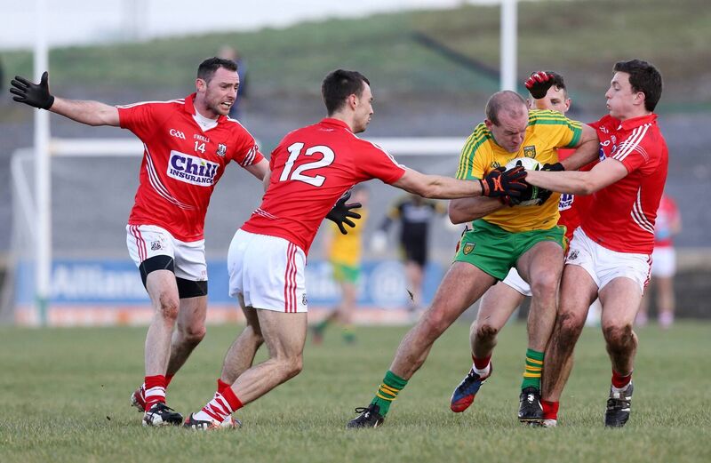 Neil Gallagher of Donegal under pressure from Kevin O'Driscoll and Mark Collins of Cork in 2015. Picture: INPHO/Andrew Paton Neil Gallagher of Donegal under pressure from Kevin O'Driscoll and Mark Collins of Cork in 2015. Picture: INPHO/Andrew Paton