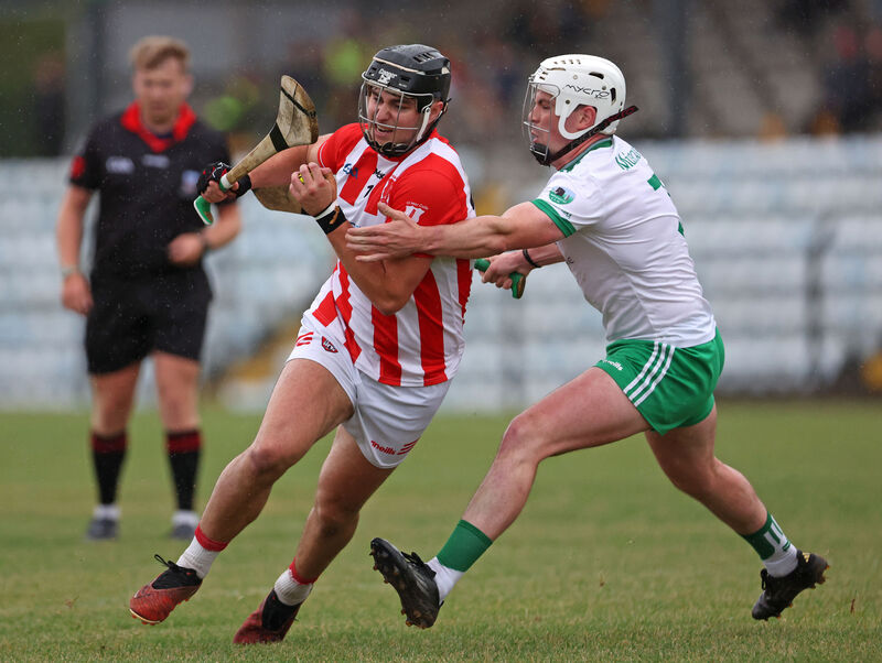 Imokilly's Joe Stack under pressure from Fenton Denny of Muskerry. Picture: Jim Coughlan