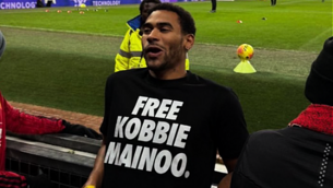 Man Utd star’s half-brother wears ‘Free Kobbie Mainoo’ shirt to Bournemouth draw Man Utd star’s half-brother wears ‘Free Kobbie Mainoo’ shirt to Bournemouth draw