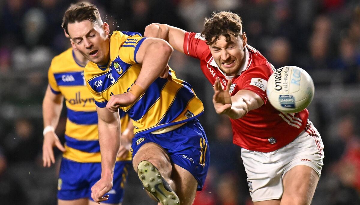 John McManus of Roscommon in action against Paul Walsh of Cork. Picture: Piaras Ó Mídheach/Sportsfile