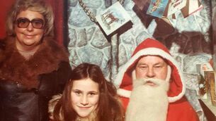<p class="contextmenu internal_Caption">Yvonne Daly with her mother, May, visiting Santa in the early 1970s. Picture supplied by Yvonne’s husband, Fintan Bloss</p>