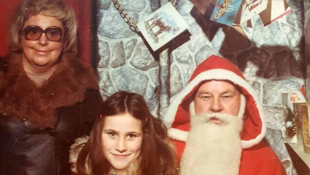 <p class="contextmenu internal_Caption">Yvonne Daly with her mother, May, visiting Santa in the early 1970s. Picture supplied by Yvonne’s husband, Fintan Bloss</p>