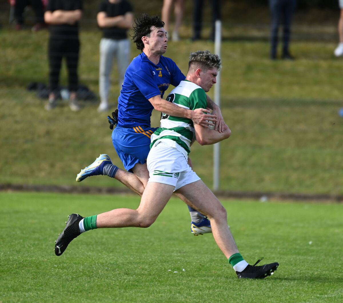 St Finbarr's Colm Scully tackles Valley Rovers' Eoin Guinane. Picture: Eddie O'Hare St Finbarr's Colm Scully tackles Valley Rovers' Eoin Guinane. Picture: Eddie O'Hare