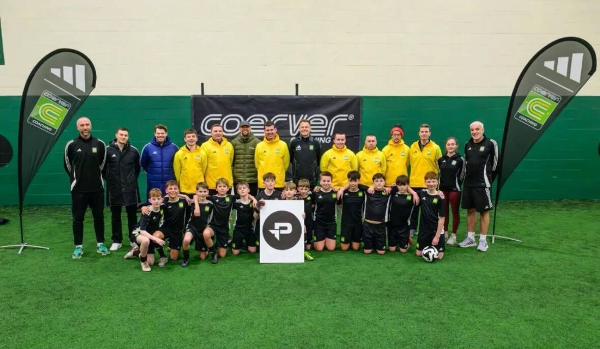 The Coerver management team and coaches including Luke Noonan with some young children at a recent training session.