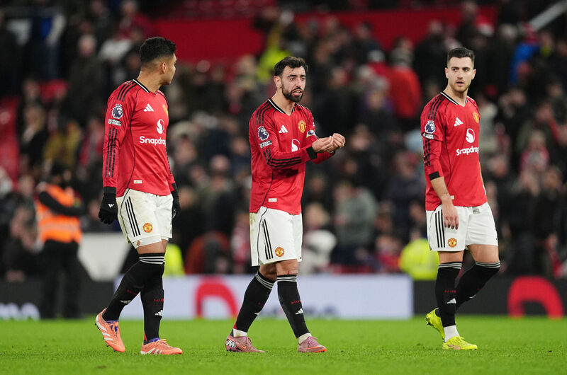 Manchester United's Bruno Fernandes (centre) after the Premier League match at Old Trafford, Manchester. Picture: Martin Rickett/PA Wire