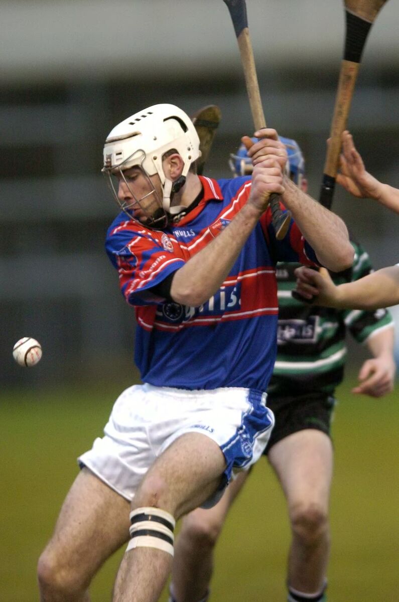 Ronan Carroll, Erin's Own, clearing from Douglas' Richard Harris in the 2005 U21 hurling final in Páirc Uí Rinn. Picture Dan Linehan