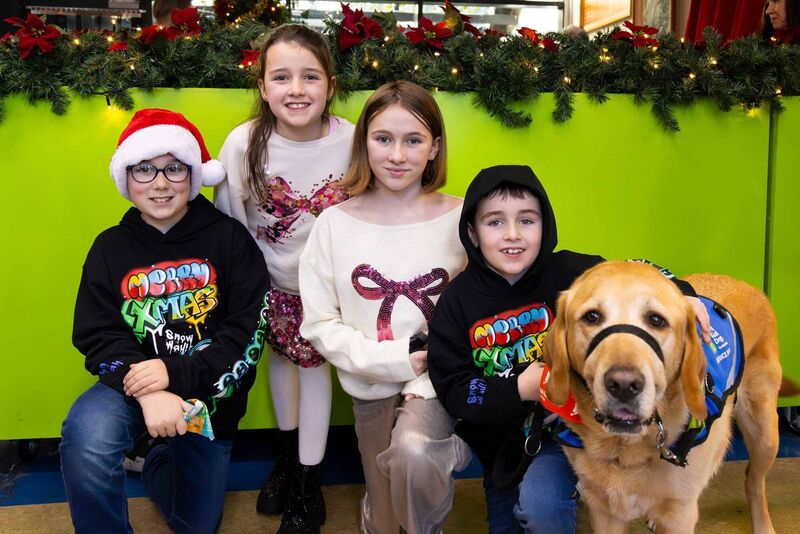 Siblings, Sean, Grace, Ellie, & Conor McCabe, pictured with Yarrow the Service Dog, as a team of Apple volunteers from Apple Cork, spent the day at the Irish Guide Dogs for the Blind HQ on Model Farm Road, helping with preparations for Christmas activities, meeting families and helping Santa and his elves in the grotto. Picture: Michael O'Sullivan / OSM PHOTO Siblings, Sean, Grace, Ellie, & Conor McCabe, pictured with Yarrow the Service Dog, as a team of Apple volunteers from Apple Cork, spent the day at the Irish Guide Dogs for the Blind HQ on Model Farm Road, helping with preparations for Christmas activities, meeting families and helping Santa and his elves in the grotto. Picture: Michael O'Sullivan / OSM PHOTO