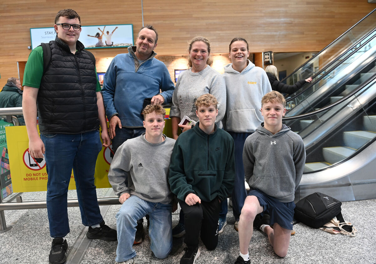 Parents Cian and Katherine McCarthy with Finn, triplets Ben, Charlie and Oliver and Isabel at Cork Airport prior to departure for Christmas 2025. Picture: Larry Cummins