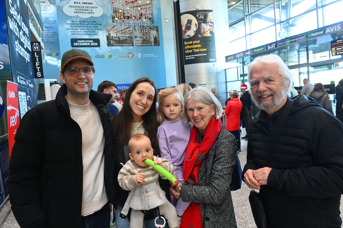  Muiris Lenihan with Pippa, baby Florence and Erin, and greeting them was Patricia and Eamon Lenihan at Cork Airport on Friday. Arrivals at Cork Airport for Christmas 2025. Picture: Larry Cummins