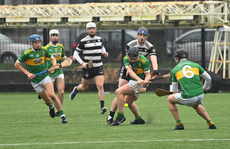 Conor Morley of Midleton putting pressure on Shandrum's Shane O'Leary. Picture: Dan Linehan