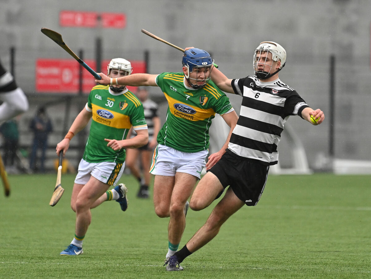 Cárthaigh Cronin of Midleton holding off Shandrum's Bobby Carroll. Picture: Dan Linehan