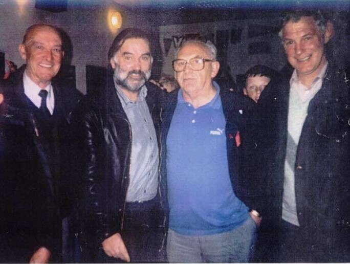 George Best with ex-professionals Jimmy Murphy, Joe Healy and Jack Morley on a visit to Passage AFC. 
