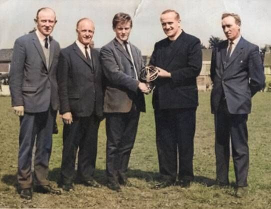 Barry McGann receiving his Ireland FAI Youths cap, with Sonny Neville, Denis Herrick and Mossie Linnane.