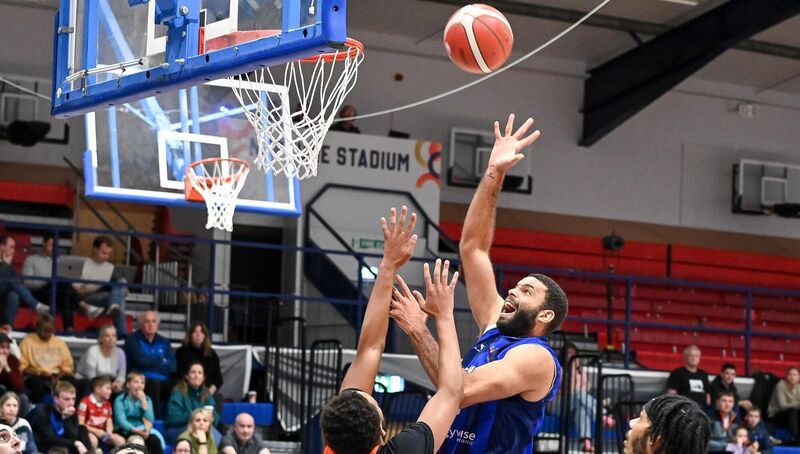 Neptune's Adon Gregoria looks for the hoop under pressure from Sligo's Ja'zere Noel. Picture: David Keane.