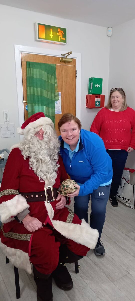 Lisa Murphy and Liz O'Halloran with Santa. Lisa Murphy and Liz O'Halloran with Santa.