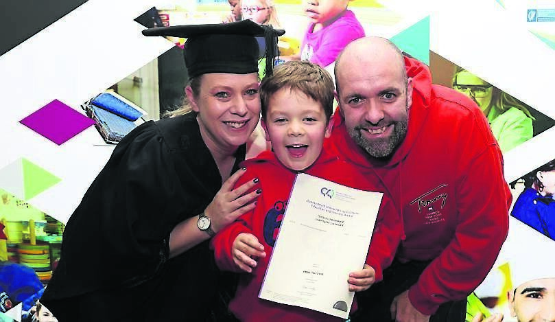 Graduate Emma O’Sullivan, level 6 human resources management, with her son Oisin and husband Dave, all from Carrigaline.