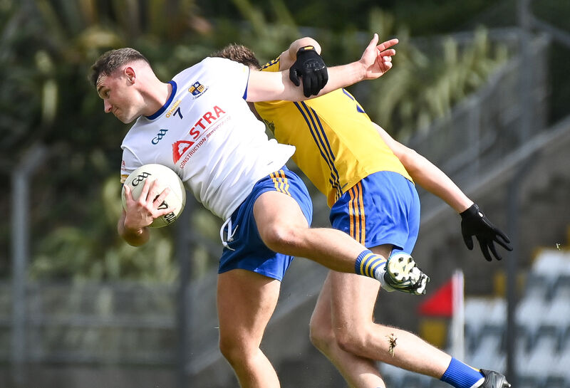  Carrigaline's Jack McCarthy is fouled as he tries to get away from St Finbarr's Ethan Twomey during their Premier SFC clash at Páirc Uí Rinn this year. Picture: David Keane.