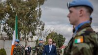 Irish Taoiseach Micheál Martin inspects Irish troops during