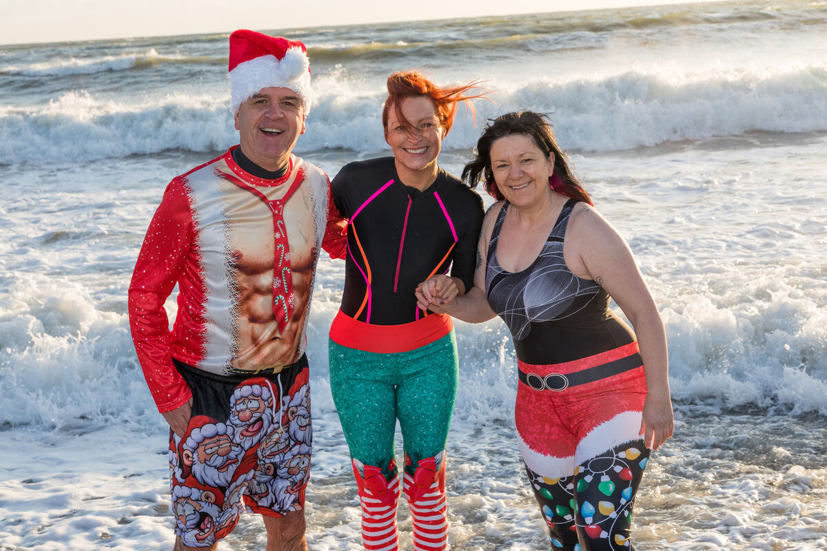 Adrian, Karen and Audrey Kelleher taking part in the Christmas Day swim at Fountainstown. Picture: David Creedon. Adrian, Karen and Audrey Kelleher taking part in the Christmas Day swim at Fountainstown. Picture: David Creedon.