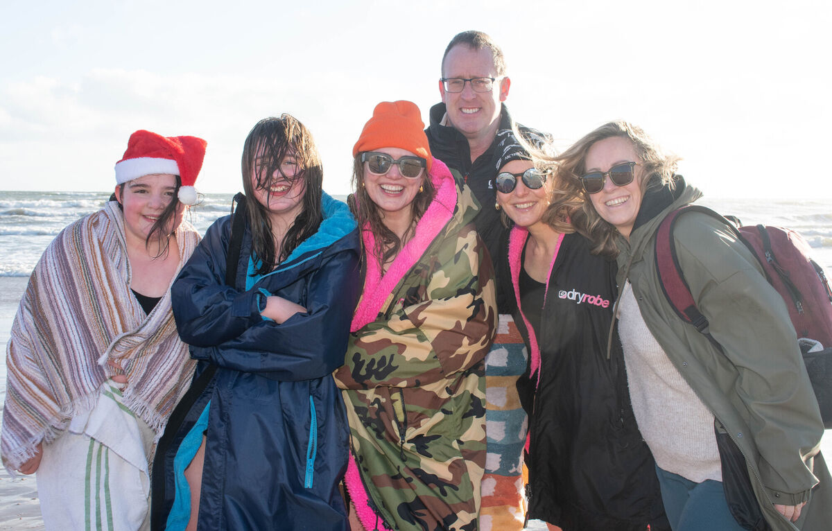 All wrapped up following their swim in Youghal on Christmas day were Ava Collins, Roisin, Fiona and Danny Tonge with Sam and Sarah Collins from Youghal and Cork. Picture: Howard Crowdy All wrapped up following their swim in Youghal on Christmas day were Ava Collins, Roisin, Fiona and Danny Tonge with Sam and Sarah Collins from Youghal and Cork. Picture: Howard Crowdy