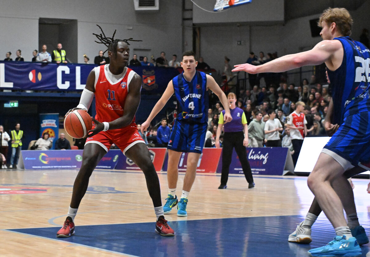  Tala Fam Thiam, UCC Demons, looking for a way past Eoin Nelson of Neptune. Picture: Dan Linehan