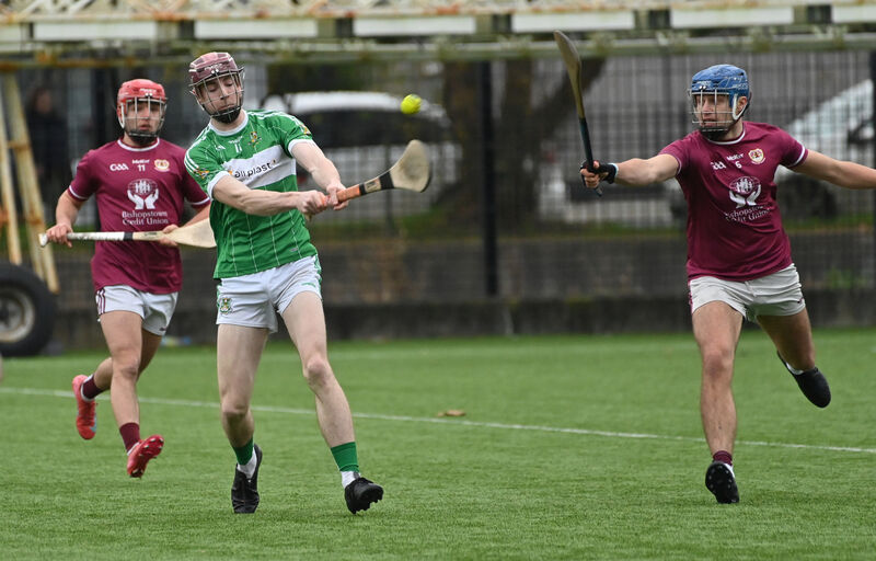  Daire Daly, Bishopstown, looking to block down this shot by James Foley, Aghabullogue. Picture: Dan Linehan