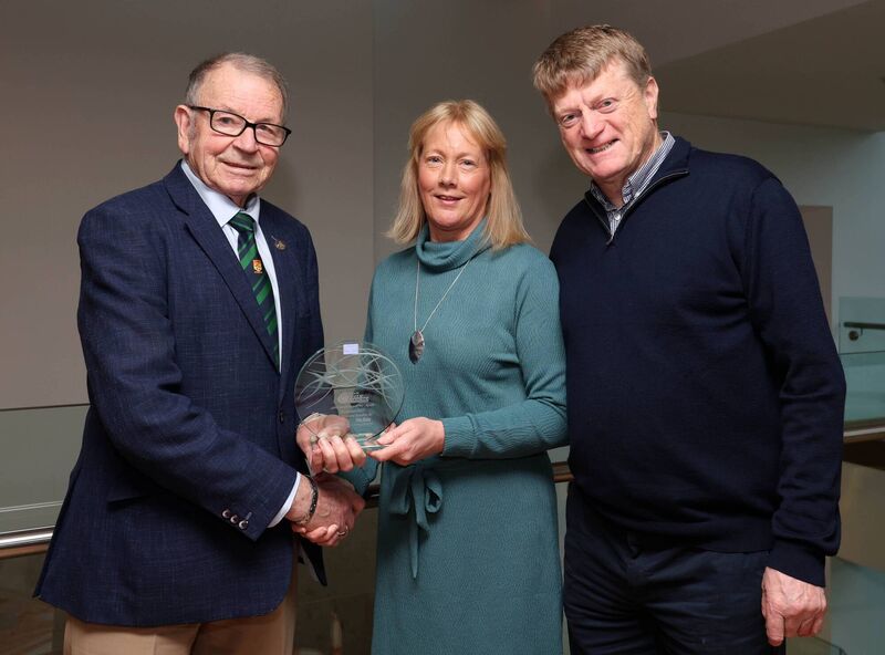 Frank Walley, President Cork City Sports, presenting the November award for Fiona Everard accepted by her parents, Denise and Martin Everard. Picture: Jim Coughlan.