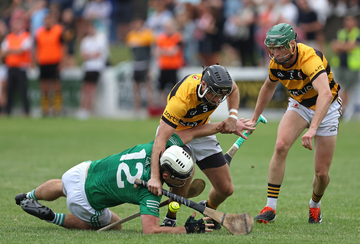 Keith Buckley and Ciaran Flynn, Na Piarsaigh, try to stop Barry Walsh, Killeagh during thier Senior A Hurling Championship match at Midleton. Keith Buckley and Ciaran Flynn, Na Piarsaigh, try to stop Barry Walsh, Killeagh during thier Senior A Hurling Championship match at Midleton.