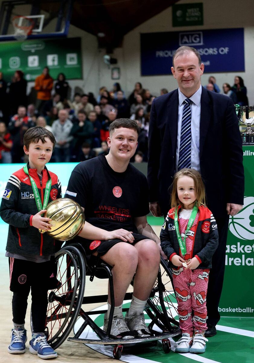 Rebel Wheelers vs Ballybrack Bulls Rebel Wheelers' Adam Drummond is presented the MPV award by Basketball Ireland CEO John Feeha Mandatory Credit ©INPHO/Bryan Keane