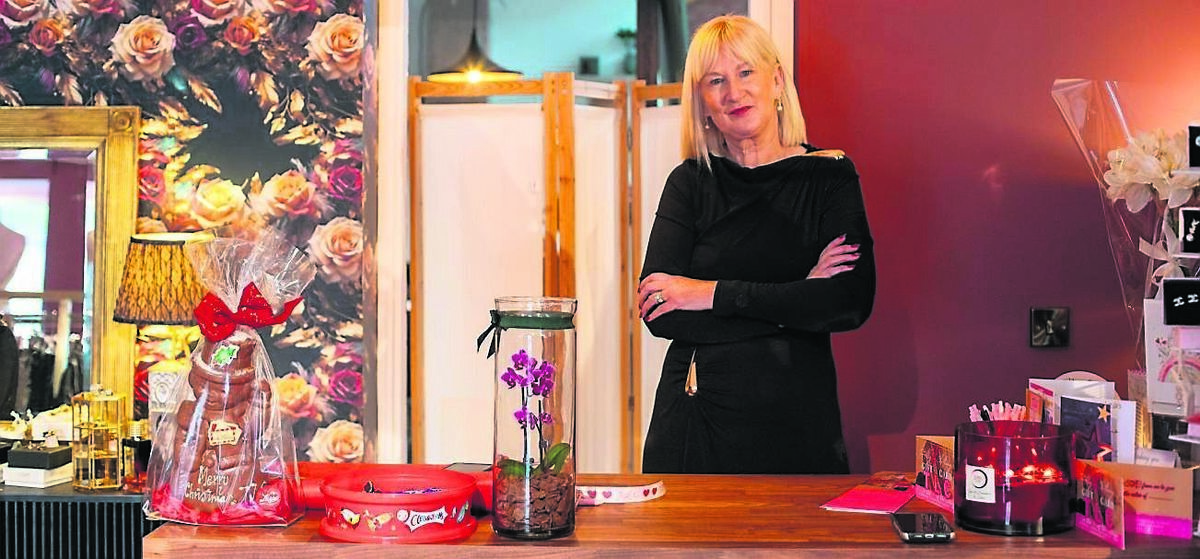 Lorraine O’Neill in her clothes boutique and coffee bar. “You could feel the energy, that people had lived their lives here,” she said of her first impression of the former pub