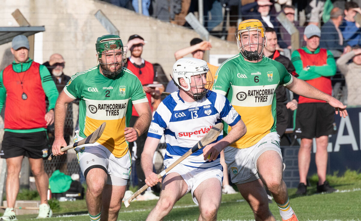 Bride Rovers' Jamie Peters (left) and Cillian Tobin in pursuit of Inniscarra's Daniel Murphy in this year's Co-op SuperStores Cork SAHC quarter-final at Páirc Uí Rinn. Picture: Howard Crowdy