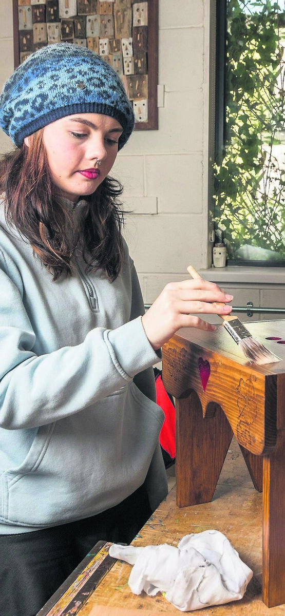 Charlie Tuschewski putting the finishing touches to a seat she designed and made on the QQ1 Level 5 course on Wood Craft and upcycling at the Cork College of FET, Tramore Road, Cork. Charlie is 18 and the youngest person on the course.	Picture: David Creedon
