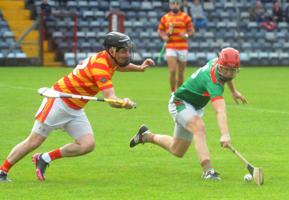 Newcestown's Daniel Twomey battles against John Barry of Fr O'Neill's in the 2020 SAHC. Picture: Denis Minihane
