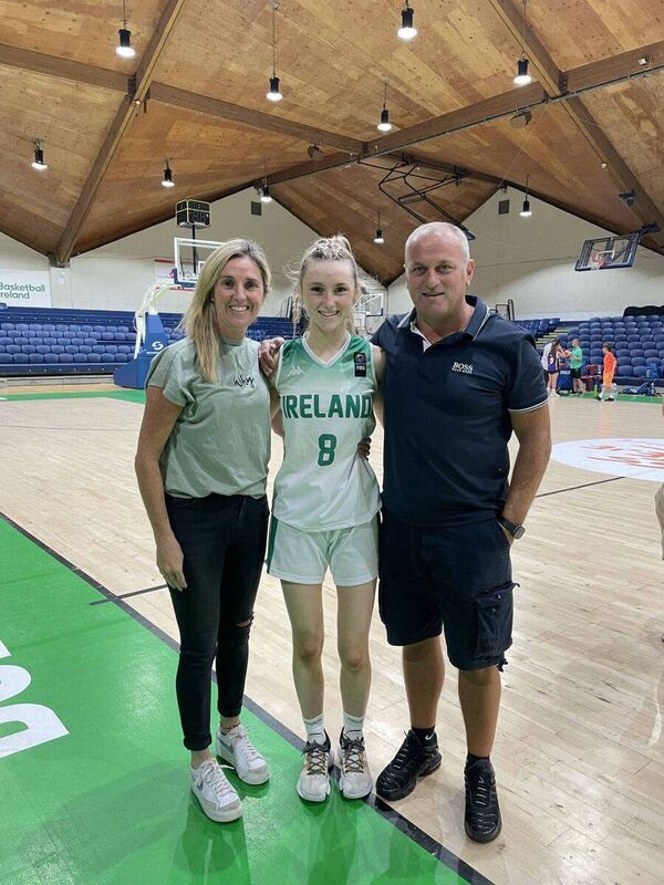 Cork Basketball: Amy Duggan with her parents Cathy and Eamon at the National Arena.