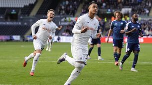 <p>Swansea City's Adam Idah (second from left)celebrates scoring their side's first goal of the gameduring the Sky Bet Championship match at the Swansea.com Stadium</p>