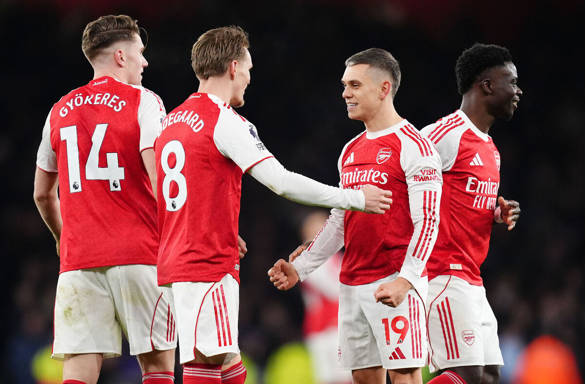 Arsenal's Leandro Trossard (centre right) celebrates scoring the side's third goal with Martin Odegaard during the Premier League match against Villa at the Emirates Stadium, London. Picture: John Walton/PA Wire