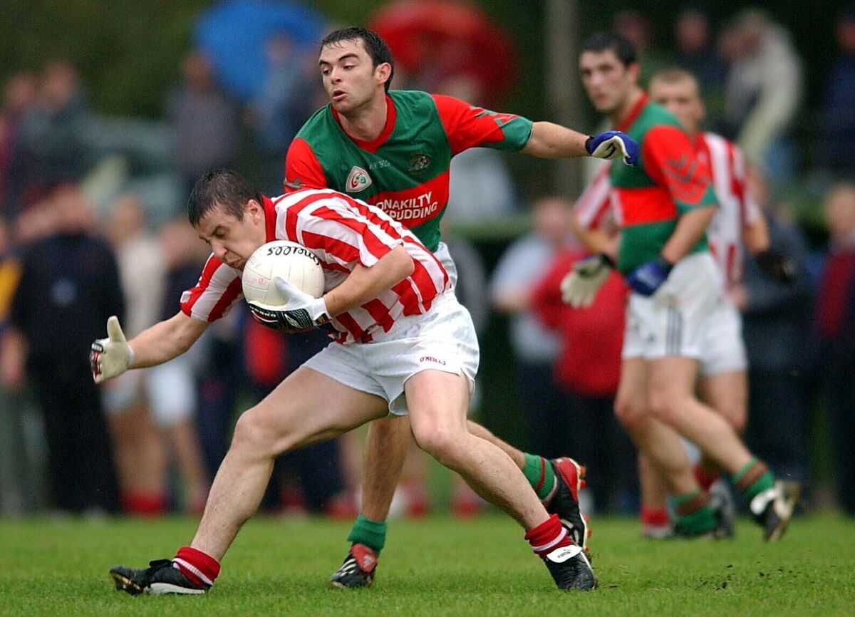 Derek Barrett, Imokilly, holding of Clonakilty's Colm O'Donovan during their SFC match at Ballygarvan in 2003. Picture Dan Linehan